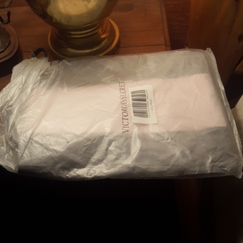 New, black and pink overnight bag